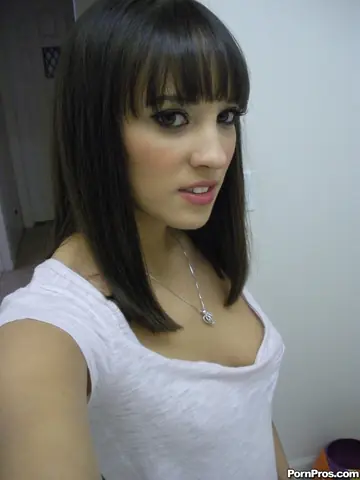 Nadia Aria – Busty Latina Undresses in the Bathroom Mirror for Selfies