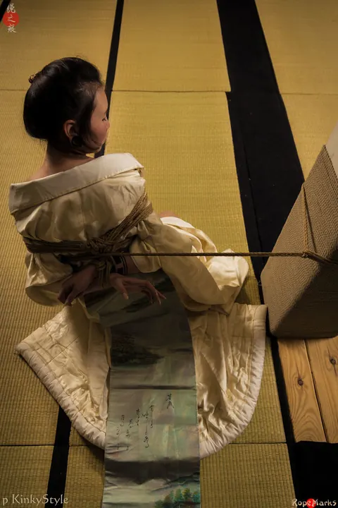 Asian Brunette Restrained with Rope in Shibari Session – photo 7 of 16