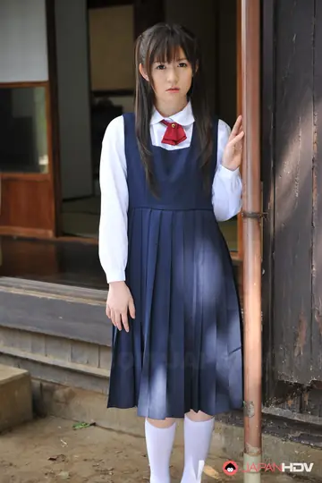 Ai Uehara – Slim Japanese Brunette Poses in a Skirt in the Garden