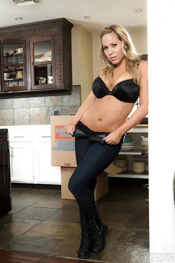 Olivia Austin – Thick Blonde with Big Tits and Piercings Poses in the Kitchen