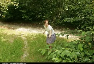 Dirty Angie – Slim Mature Redhead Lifts Her Skirt and Spreads Outdoors