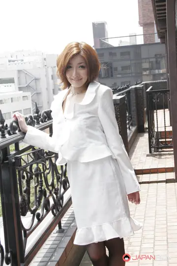 Yuna Hirose – Japanese Redhead MILF Bares Her Big Tits in a Skirt and Pantyhose