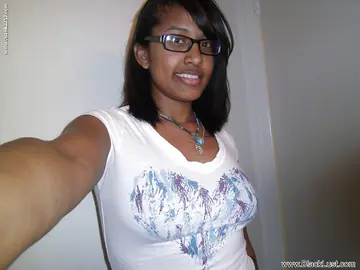 Ebony Babe with Big Tits Wearing Glasses Spreads for a Selfie