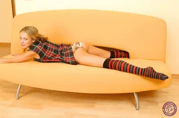 European Blonde Strips Off Her Socks and Fingers Her Hairy Pussy