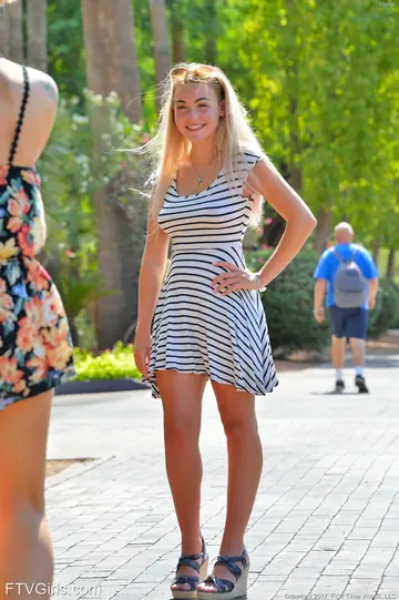 Blonde with Big Tits Reveals Her Shaved Pussy Outdoors in Heels