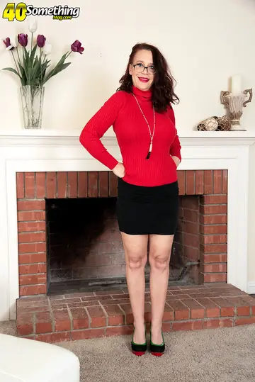 Cora Comfort – Busty Brunette MILF in Glasses Strips Out of Her Skirt and Lingerie